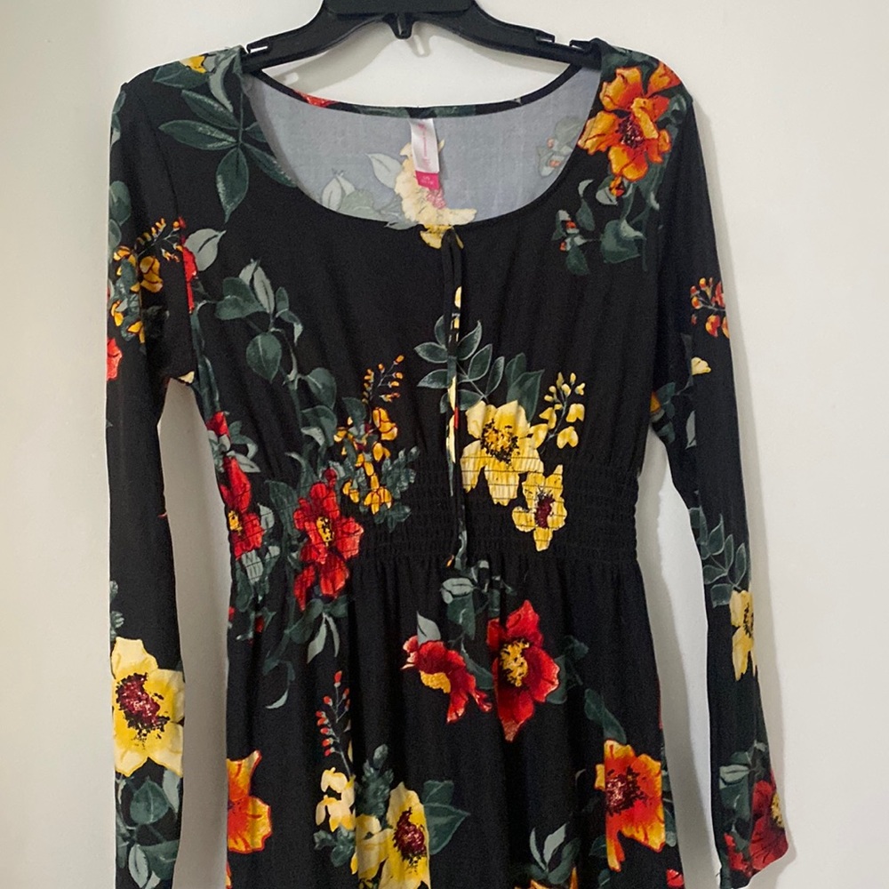 Black No Boundaries dress with floral patterns